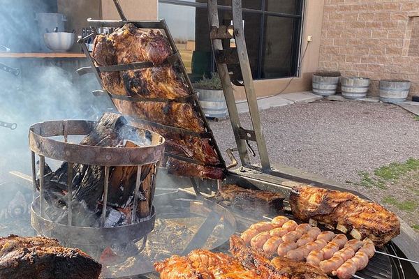 Private Mendoza Asado Lunch and Two Winery Visits with Chauffeur Transfer