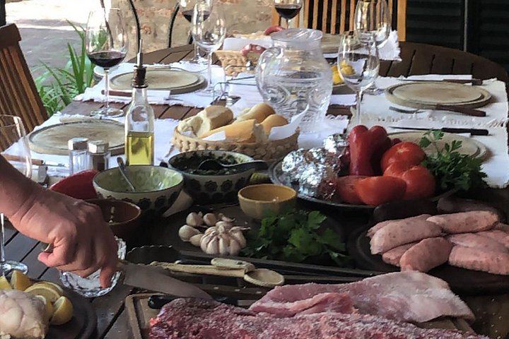 Private Mendoza Asado Lunch and Two Winery Visits with Chauffeur Transfer (4/8)