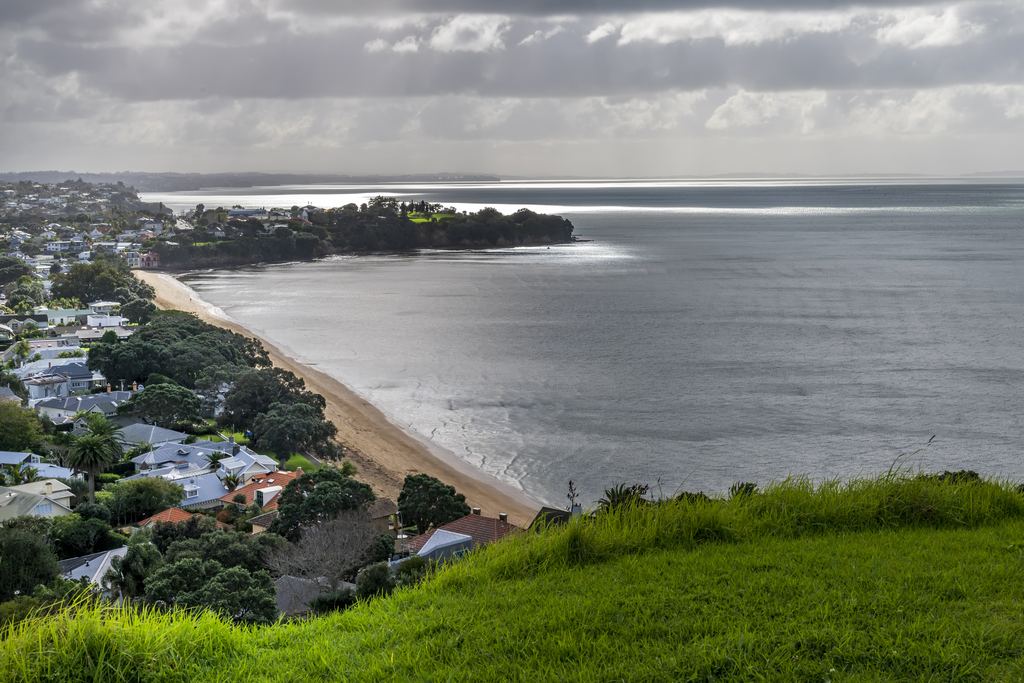 Beach and suburbs on the Auckland shore of the Hauraki Gulf