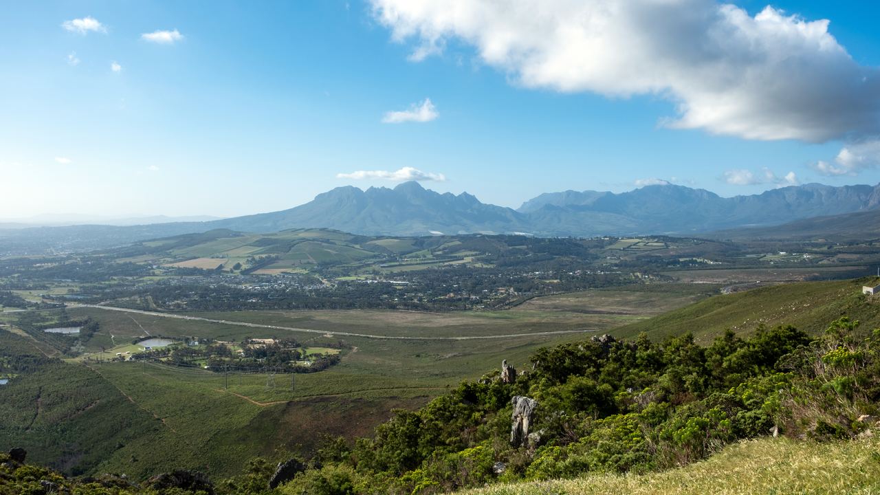 Wide view over the Helderberg basin and mountain range near Somerset West, Western Cape