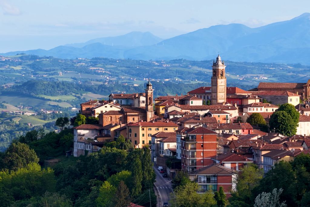 The village of La Morra in the Langhe with the Alps behind