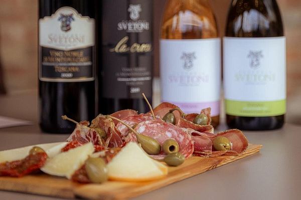 Montepulciano Winery Visit and Cellar Tour with Three Wines and a Tuscan Cold Cuts Board