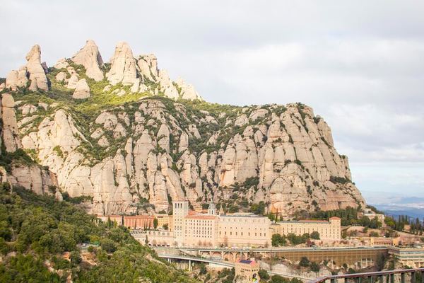 Montserrat Full Day by Cogwheel Train with Monks' Liquor Tasting and Bages Castle Winery