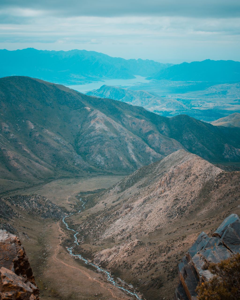 Aerial view of mountains and a winding river in Patagonia, Argentina