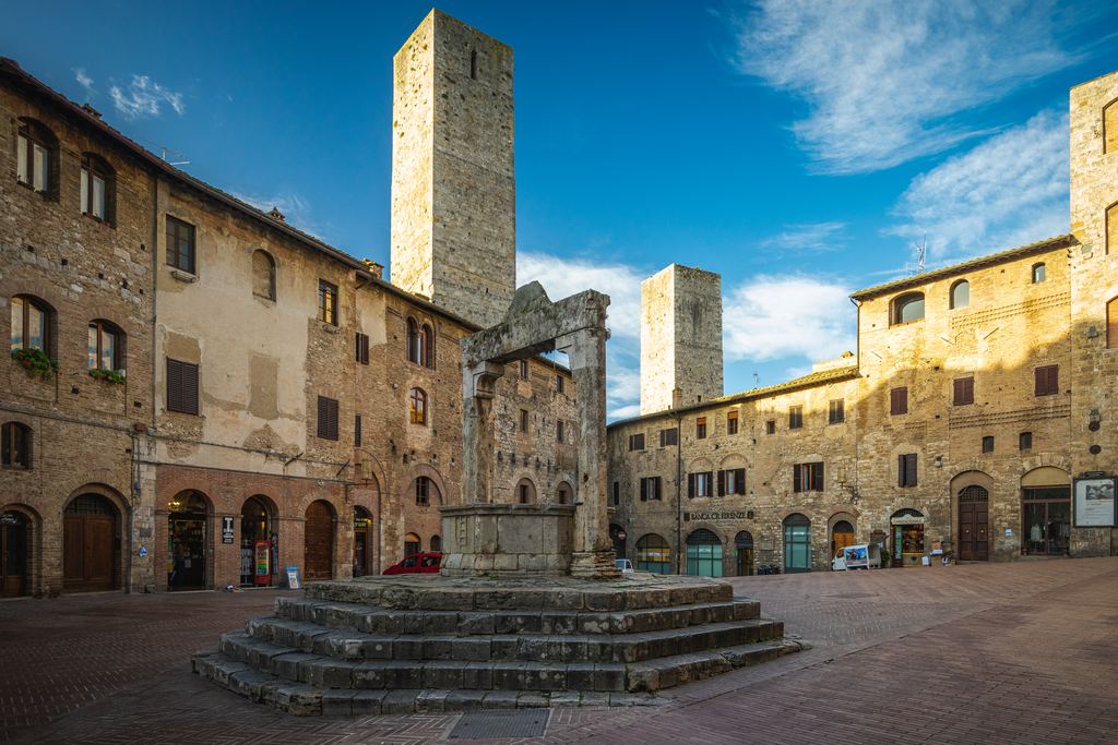 Piazza della Cisterna in San Gimignano with its well and medieval towers