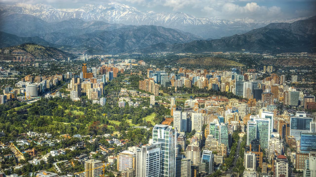 Aerial view of Santiago de Chile with the snow-topped Andes behind the city