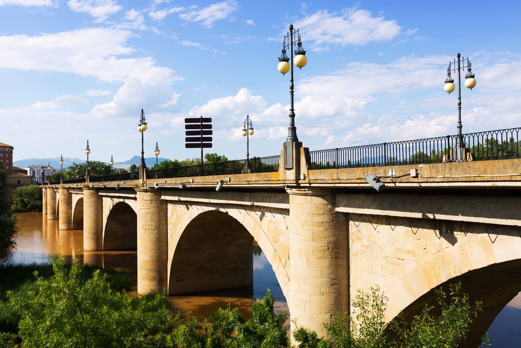 Stone bridge with lamp posts over the Ebro river at Logroño, Rioja