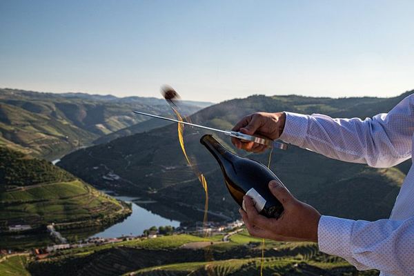 Sommelier-Led Boutique Cellar Visit with Premium Tastings, Sabre Bottle and Rabelo Boat